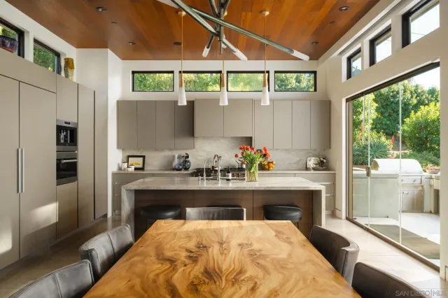 a room with a table and chairs