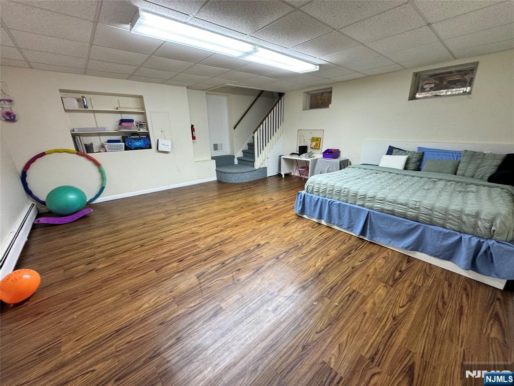 38 5th Street Closter, NJ 07624 - Photo 16 of 18 a living room with furniture and a wooden floor