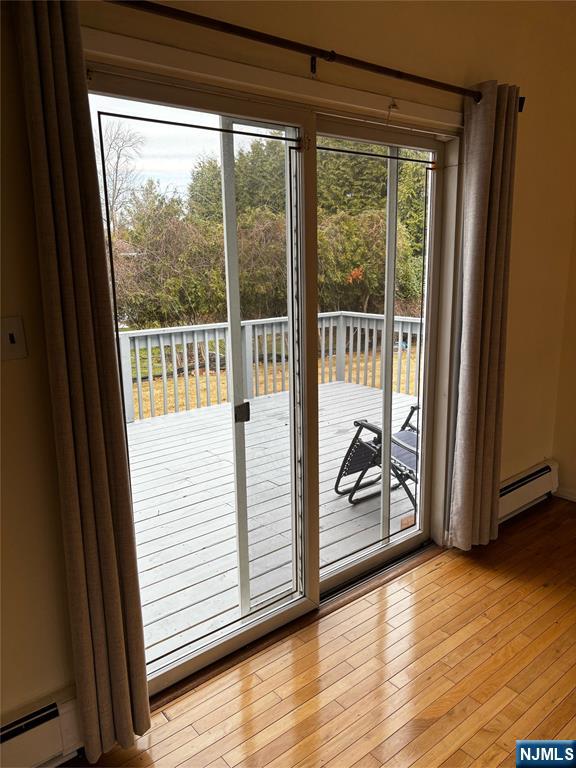 38 5th Street Closter, NJ 07624 - Photo 18 of 18 a view of a room with wooden floor and chair