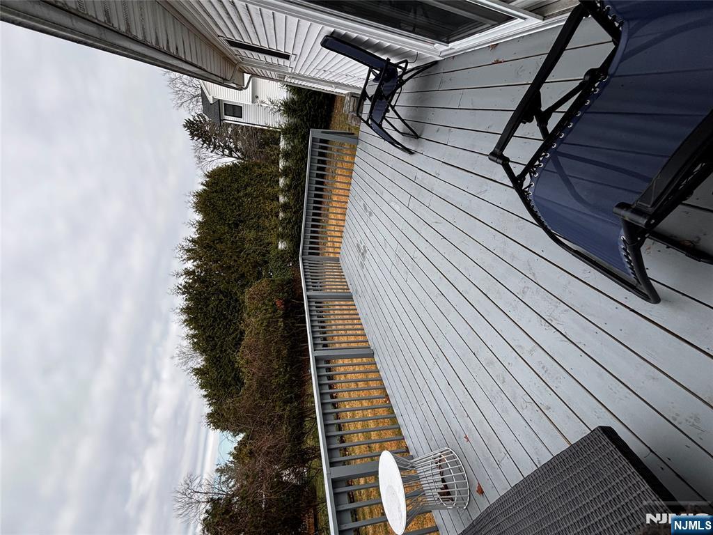38 5th Street Closter, NJ 07624 - Photo 3 of 18 a view of balcony with deck and outdoor seating