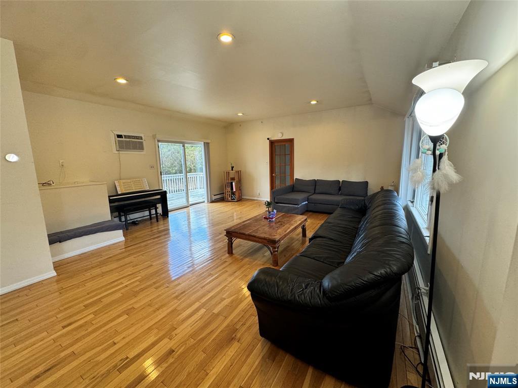 38 5th Street Closter, NJ 07624 - Photo 4 of 18 a living room with furniture and a wooden floor