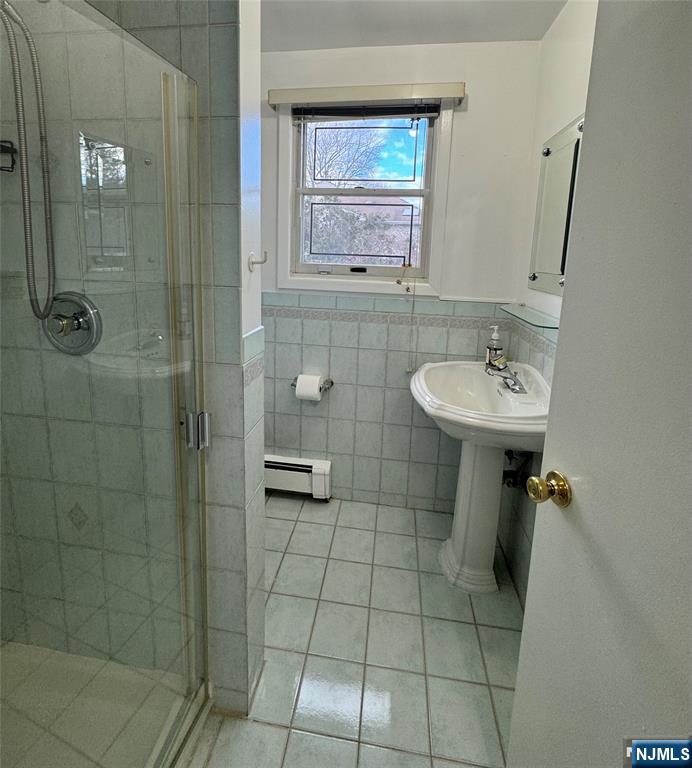 38 5th Street Closter, NJ 07624 - Photo 8 of 18 a bathroom with a sink a toilet and shower