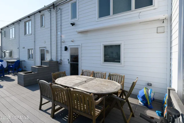 a outdoor dining space with furniture