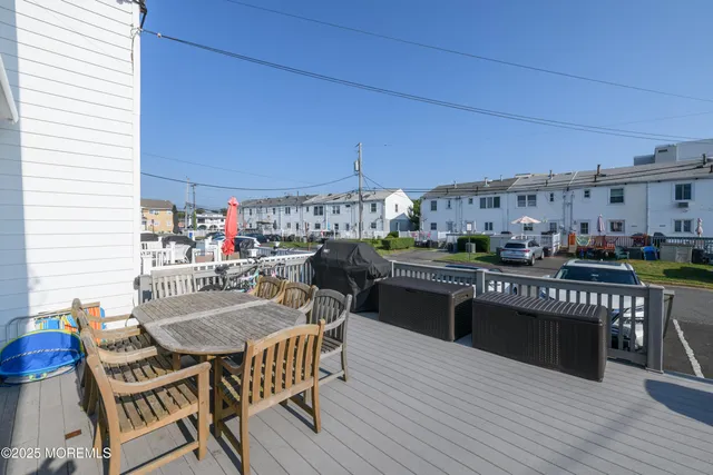 a view of a chairs and table in the terrace