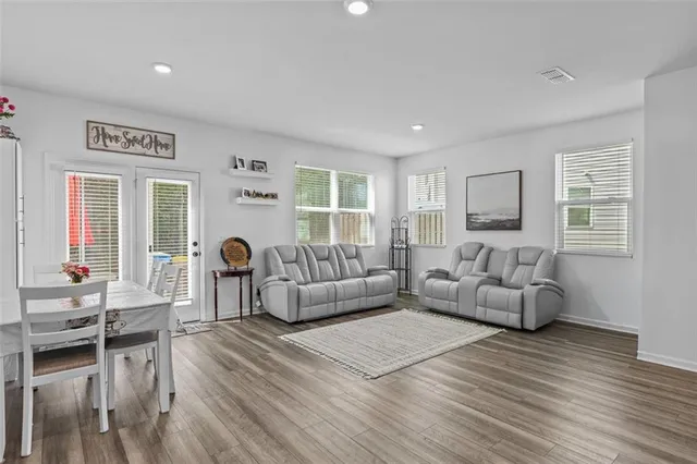 a living room with furniture and a couch