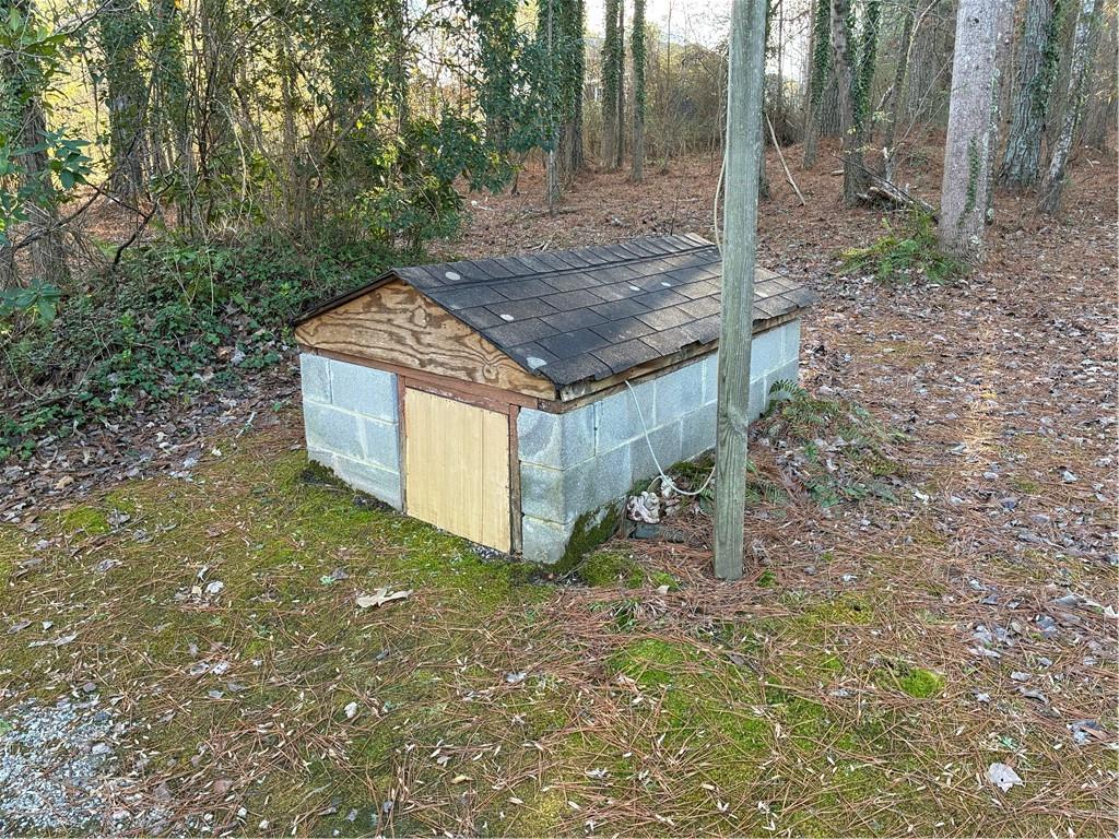 208 Manors Mill Road Dallas, GA 30157 - Photo 19 of 26 a view of a backyard with trees