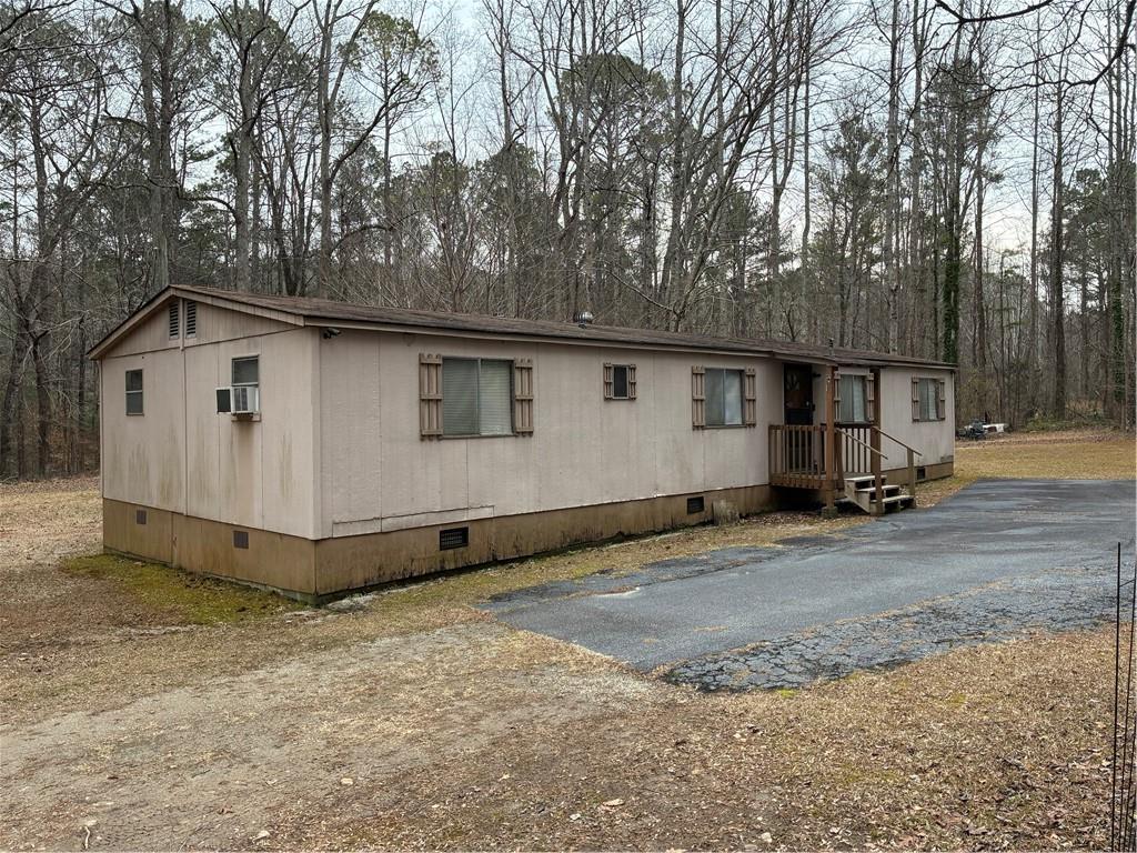 208 Manors Mill Road Dallas, GA 30157 - Photo 23 of 26 a house view with a backyard space