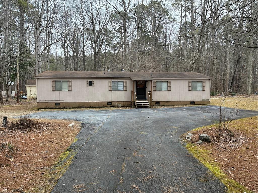 208 Manors Mill Road Dallas, GA 30157 - Photo 24 of 26 a house view with a backyard space