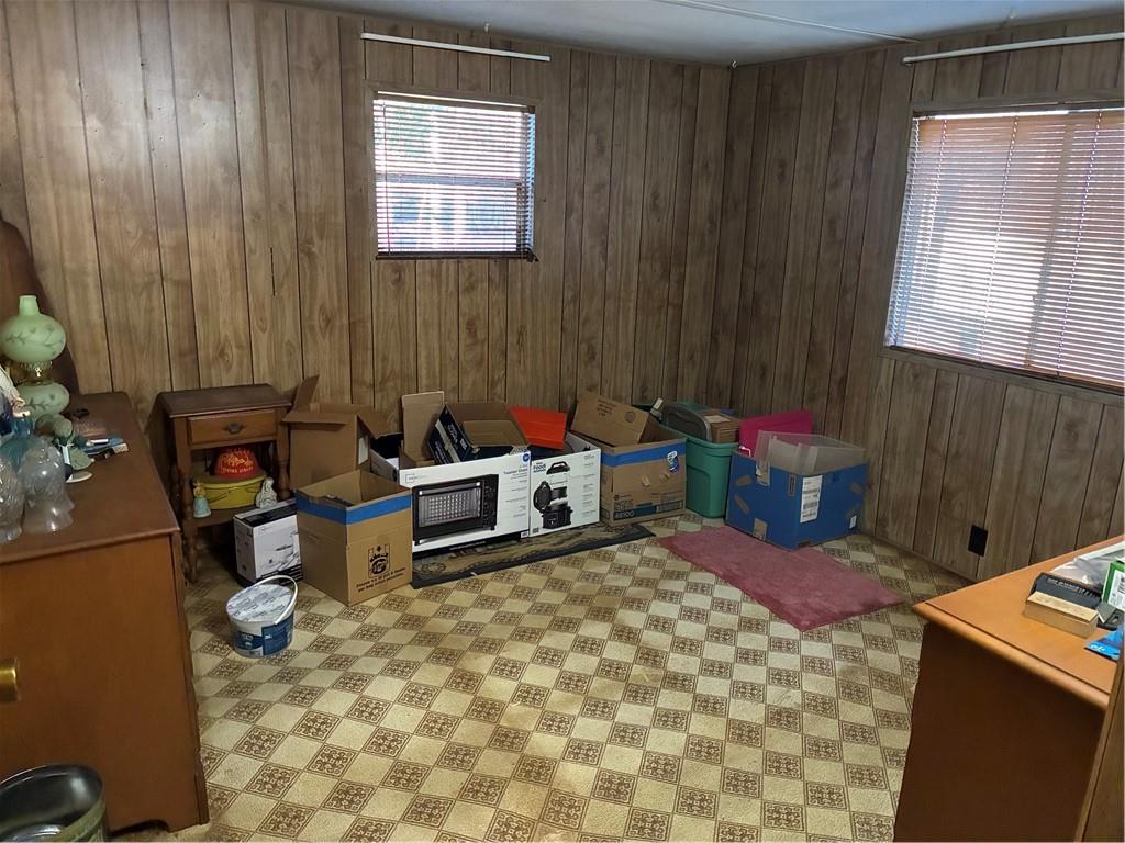 208 Manors Mill Road Dallas, GA 30157 - Photo 10 of 26 a room with furniture a rug and a window