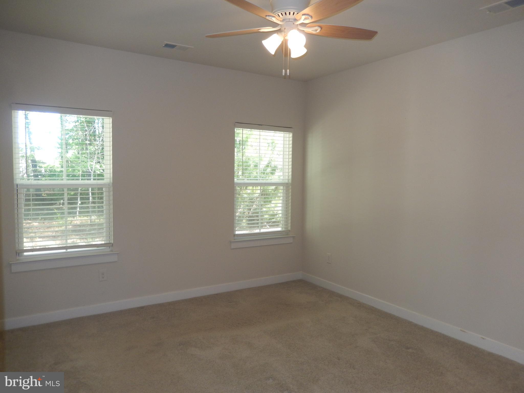 36884 Red Cedar Loop Ocean View, DE 19970 - Photo 25 of 50 a view of an empty room with a window