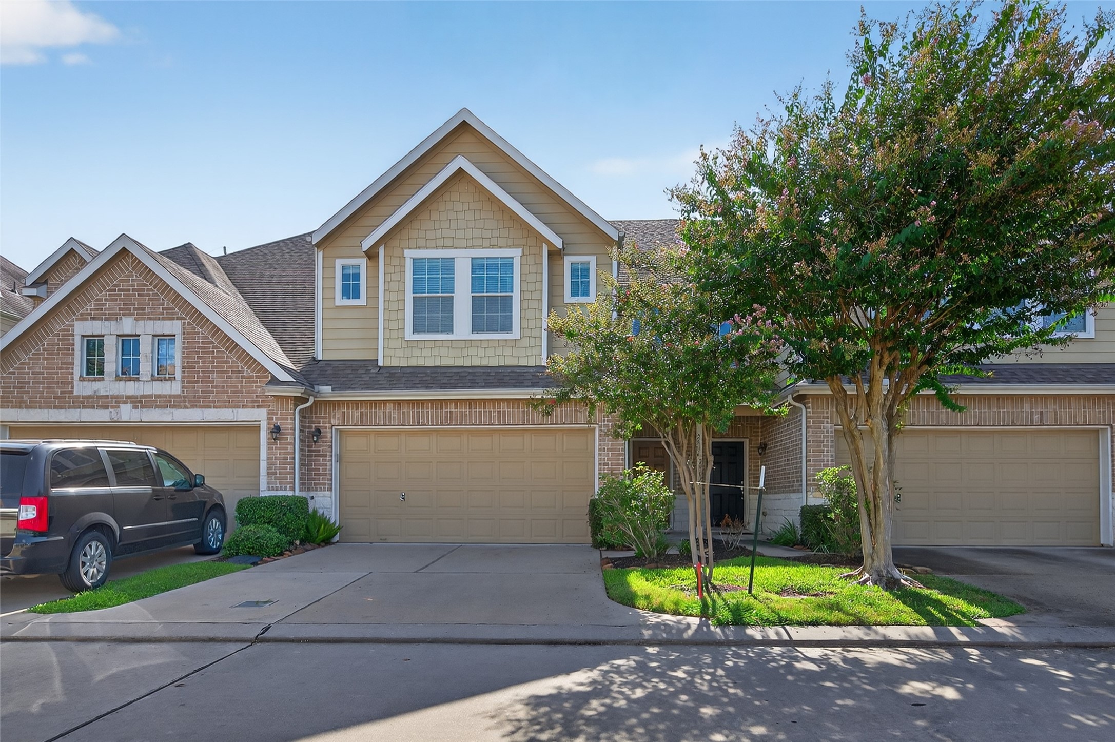 2806 Windy Thicket Lane Houston, TX 77082 - Photo 1 of 38 a front view of a house with a yard and garage
