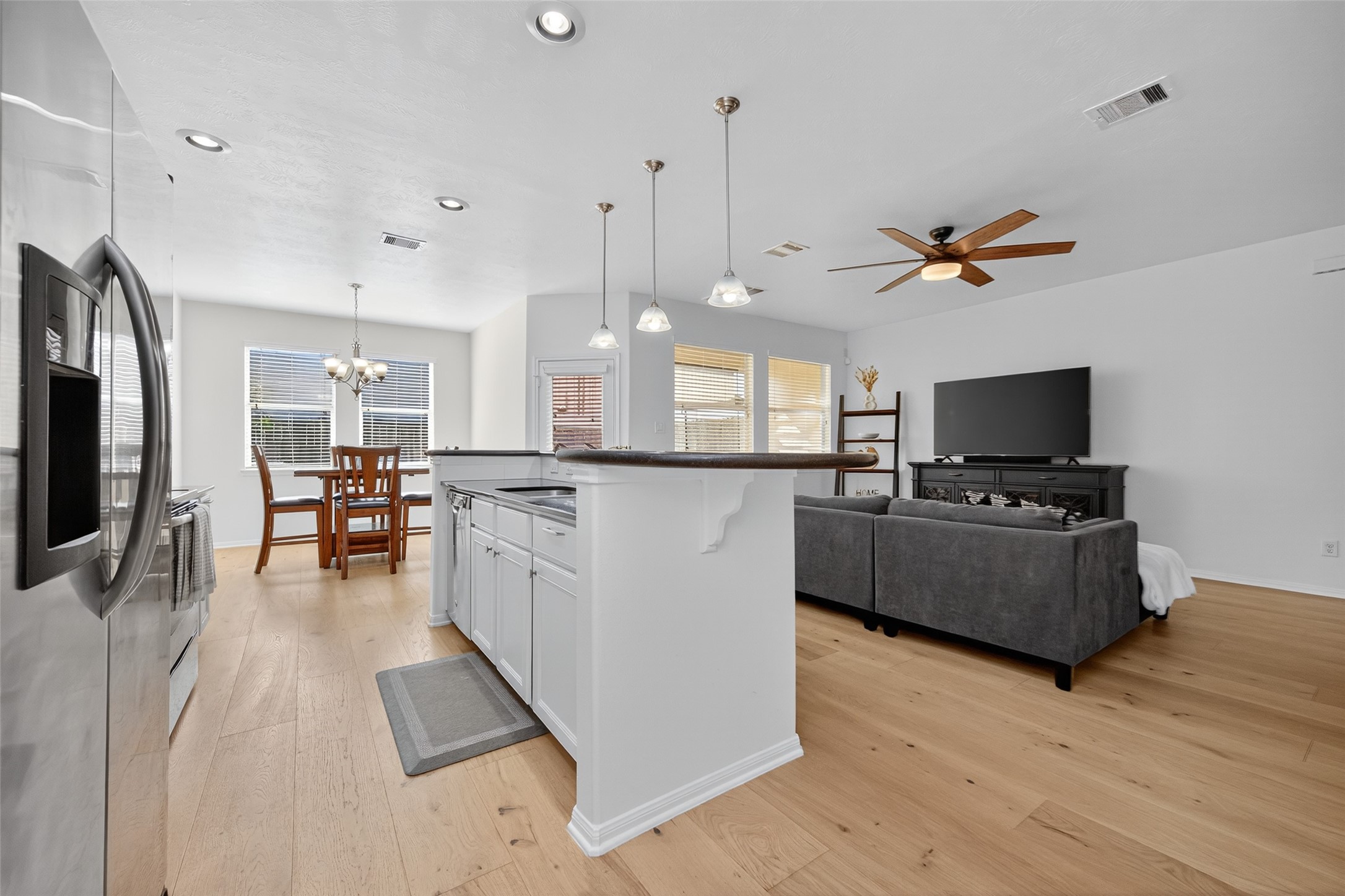 2806 Windy Thicket Lane Houston, TX 77082 - Photo 12 of 38 a living room with furniture and a flat screen tv