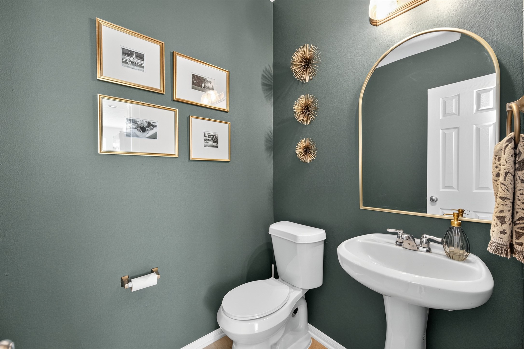 2806 Windy Thicket Lane Houston, TX 77082 - Photo 17 of 38 a bathroom with a toilet sink and mirror