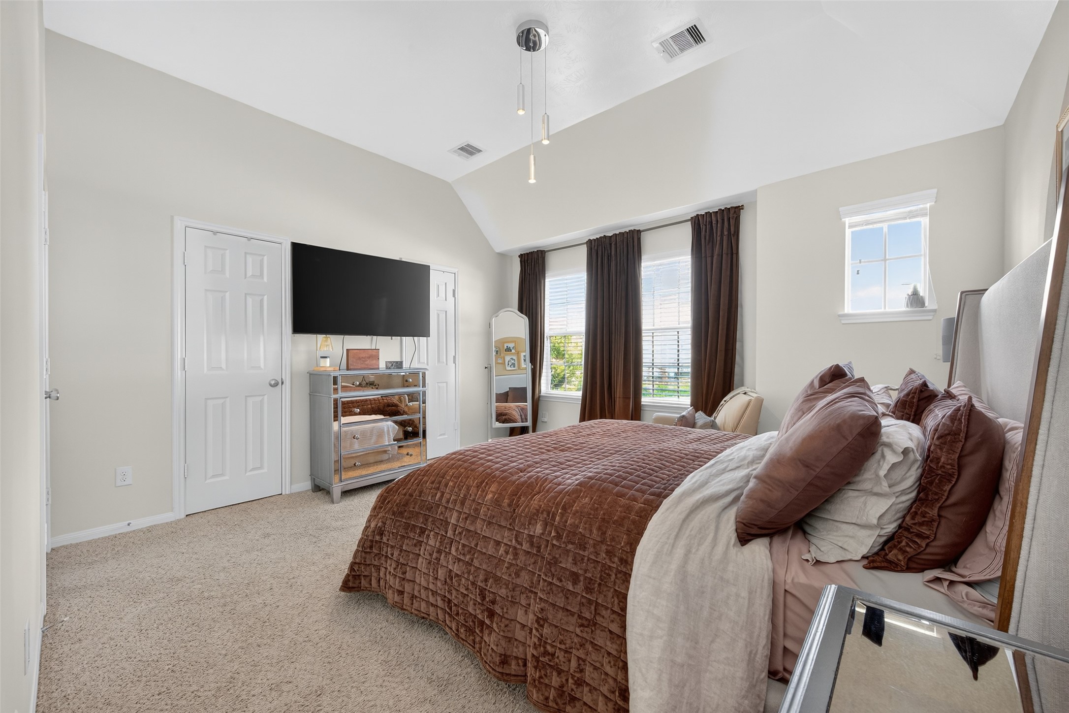 2806 Windy Thicket Lane Houston, TX 77082 - Photo 18 of 38 a bedroom with a bed and a flat screen tv