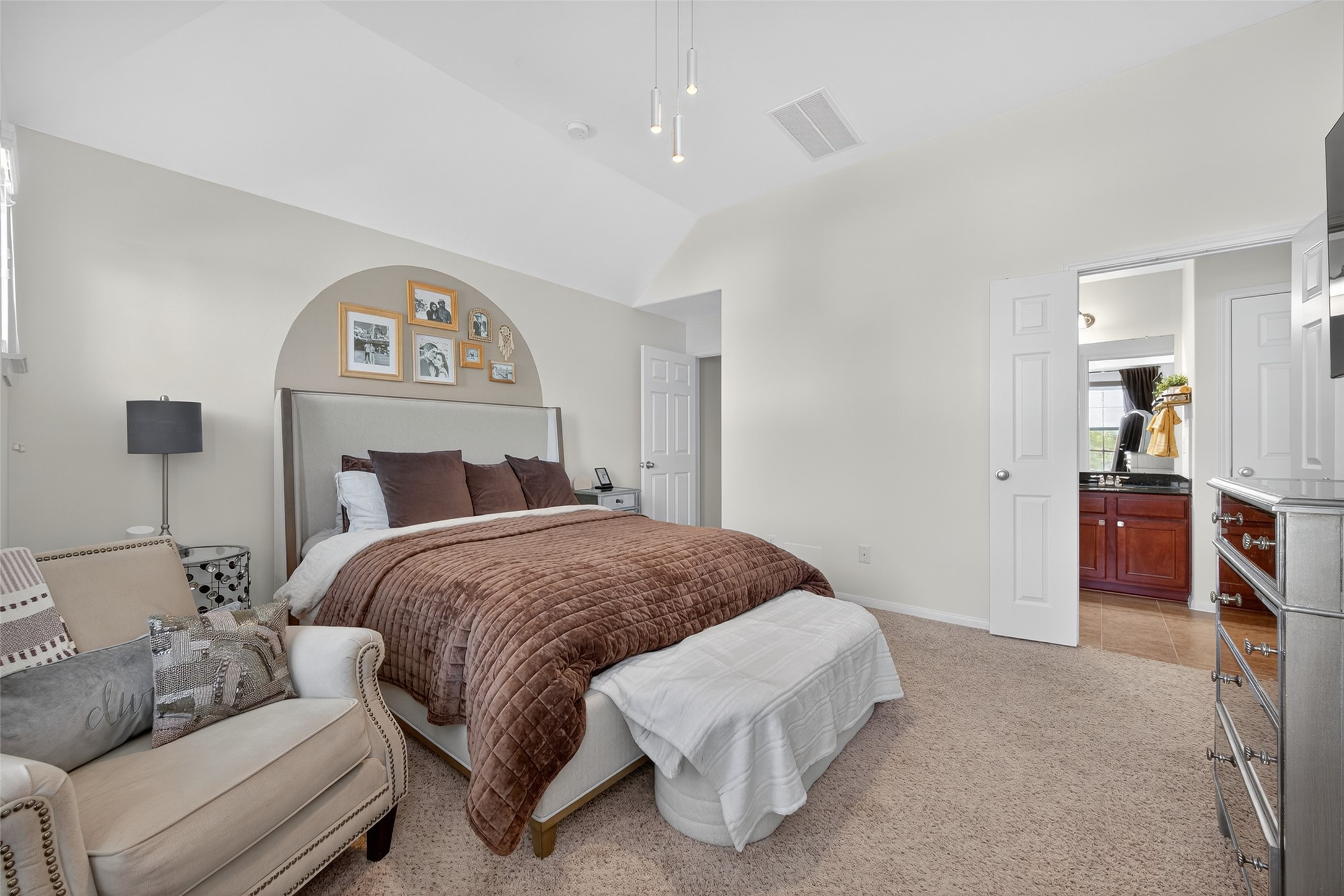 2806 Windy Thicket Lane Houston, TX 77082 - Photo 20 of 38 a bedroom with a bed and a couch