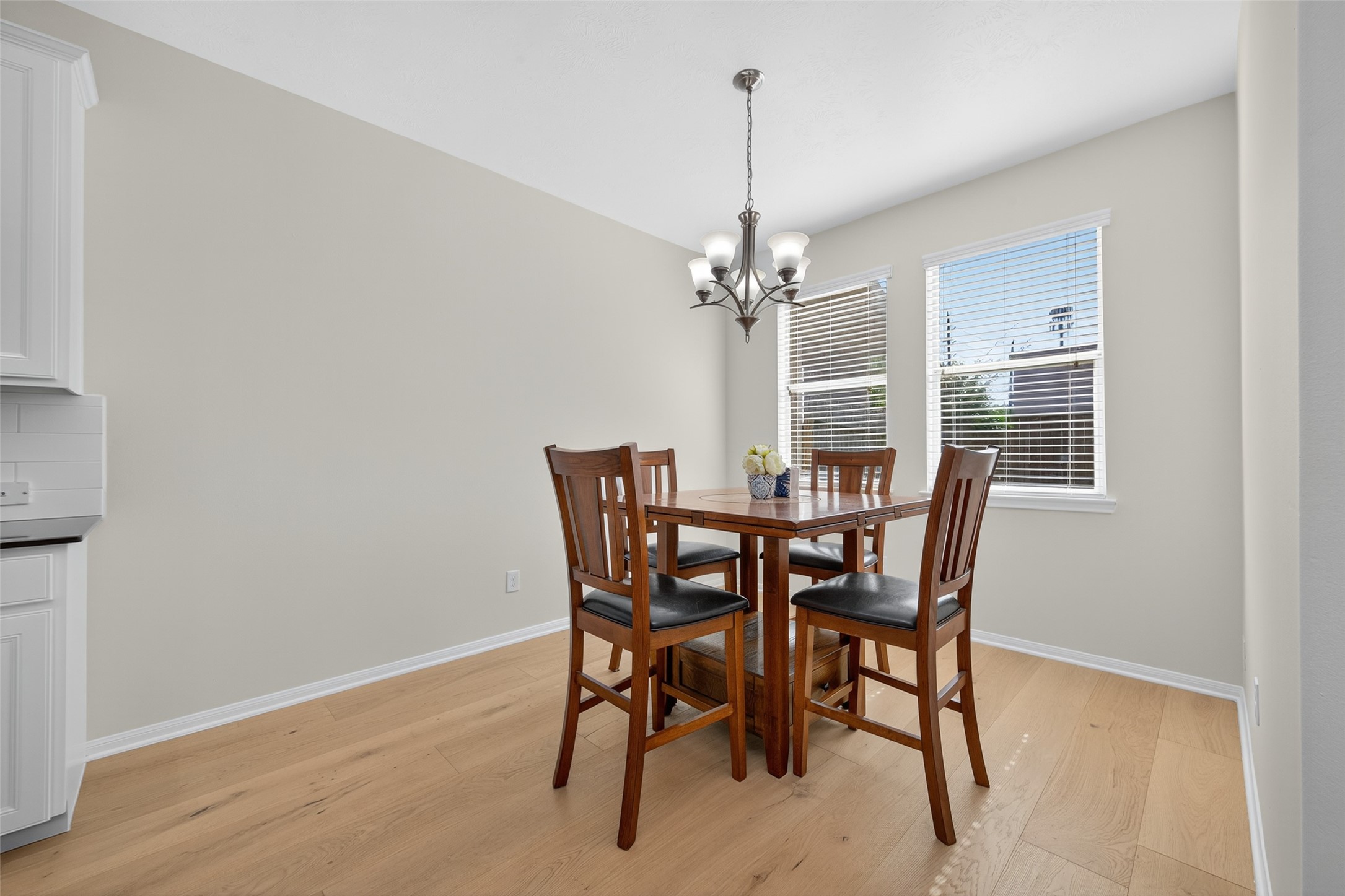 2806 Windy Thicket Lane Houston, TX 77082 - Photo 10 of 38 a view of a dining room with furniture and window