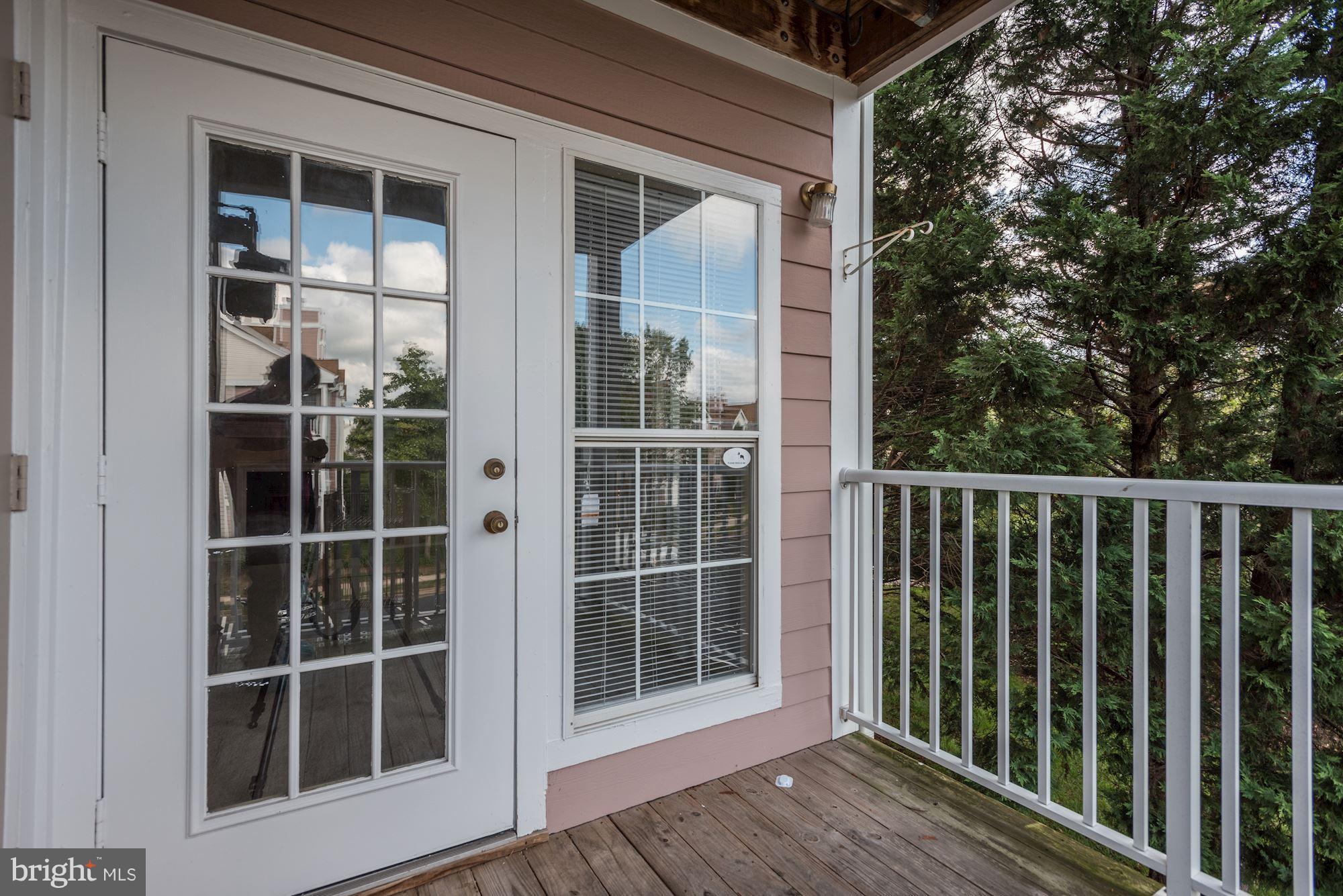 20963 Timber Ridge Terrace, Unit 202 Ashburn, VA 20147 - Photo 15 of 22 a view of front door