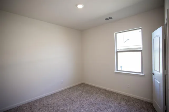 an empty room with a window