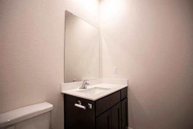 a bathroom with a sink and a toilet