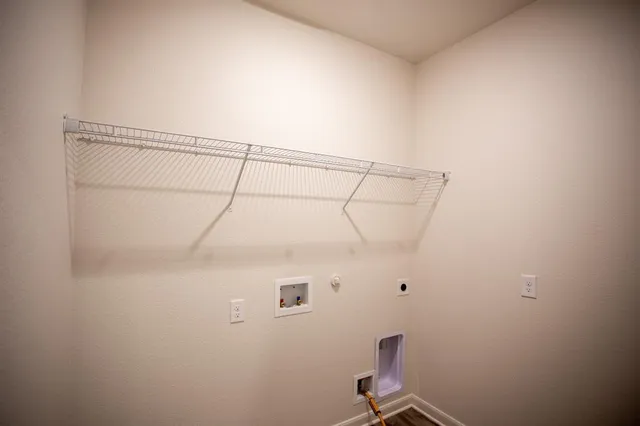 a view of a room with racks on the wall