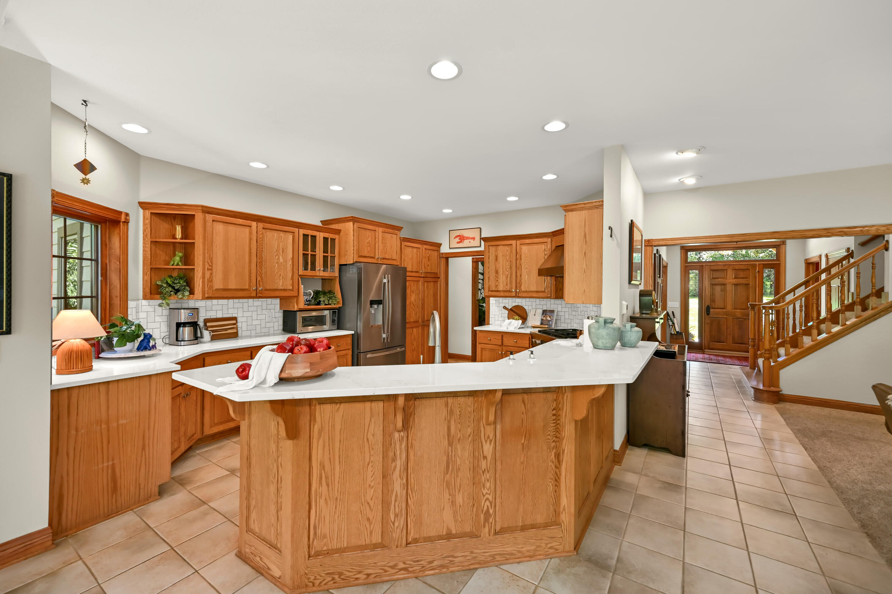 8510 Hawthorne Road Mequon, WI 53097 - Photo 11 of 49 Open Kitchen with Breakfast Bar