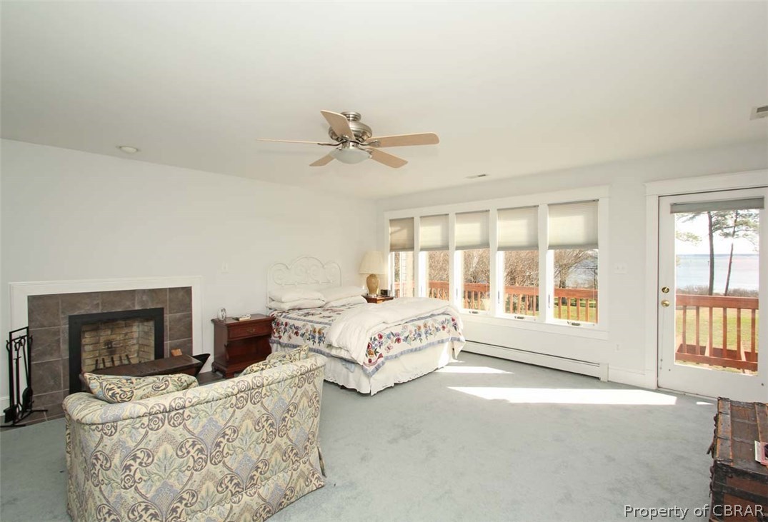3974 Weems Road Weems, VA 22576 - Photo 20 of 37 Large Master Suite with wood burning fireplace, huge views, walk-in closet, private deck & large master bathroom