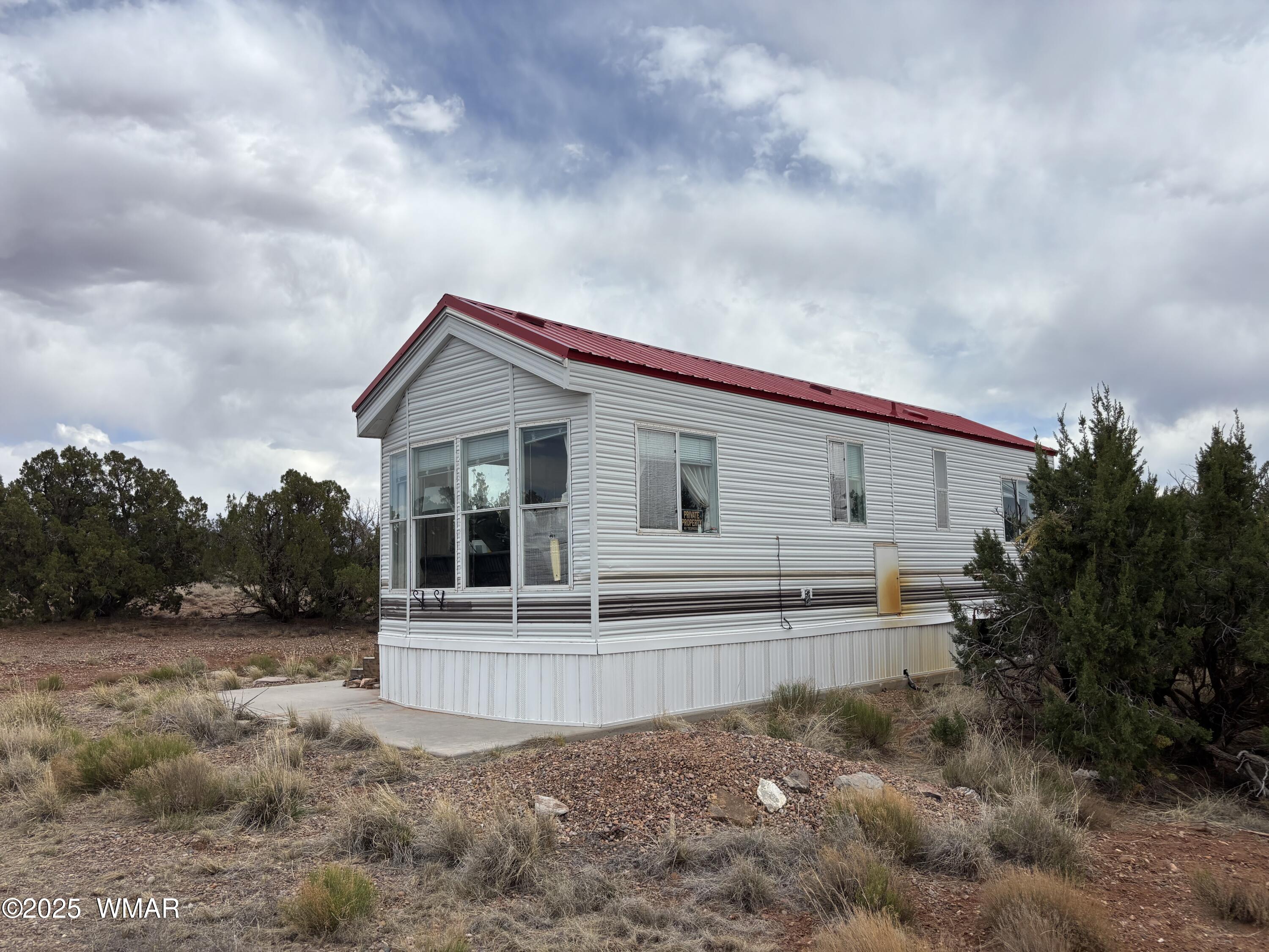 5233 Concho Ocho Road Snowflake, AZ 85937 - Photo 2 of 19 a view of house with backyard and entertaining space
