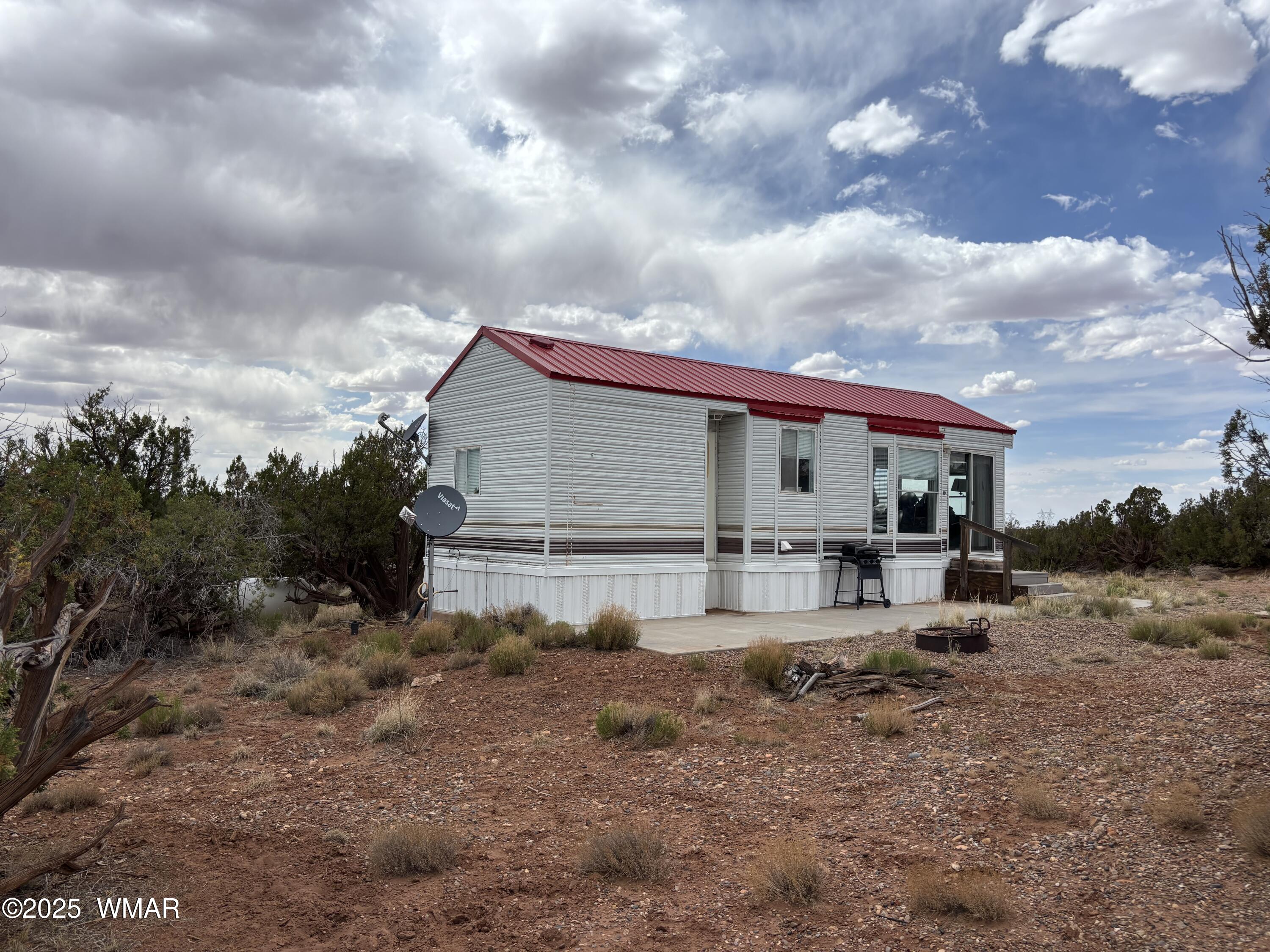 5233 Concho Ocho Road Snowflake, AZ 85937 - Photo 6 of 19 a view of a house with backyard and sitting area