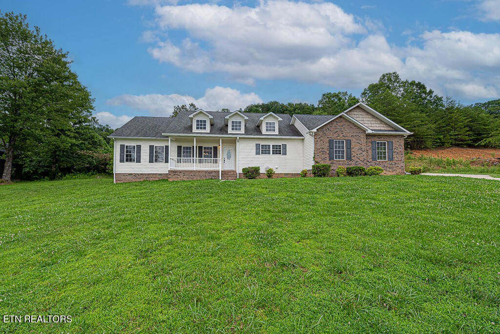 200 West Park Circle Decatur, TN 37322 - Photo 2 of 25 a view of a house with a big yard and large trees