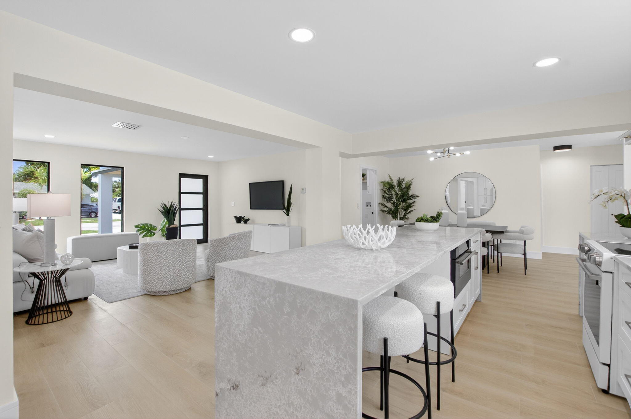 1780 Southwest 9th Street Boca Raton, FL 33486 - Photo 14 of 67 a view of a dining room with furniture and wooden floor