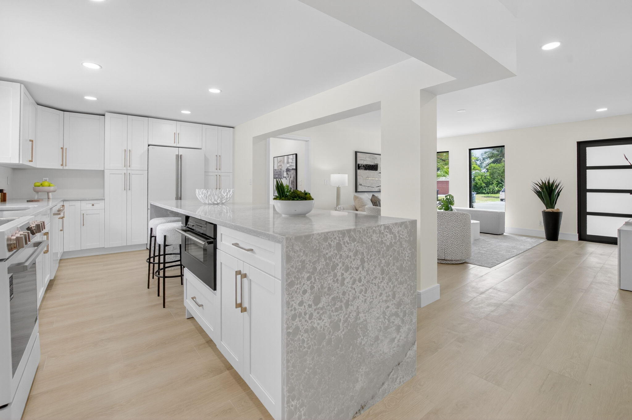 1780 Southwest 9th Street Boca Raton, FL 33486 - Photo 17 of 67 a large white kitchen with stainless steel appliances granite countertop lots of counter top space