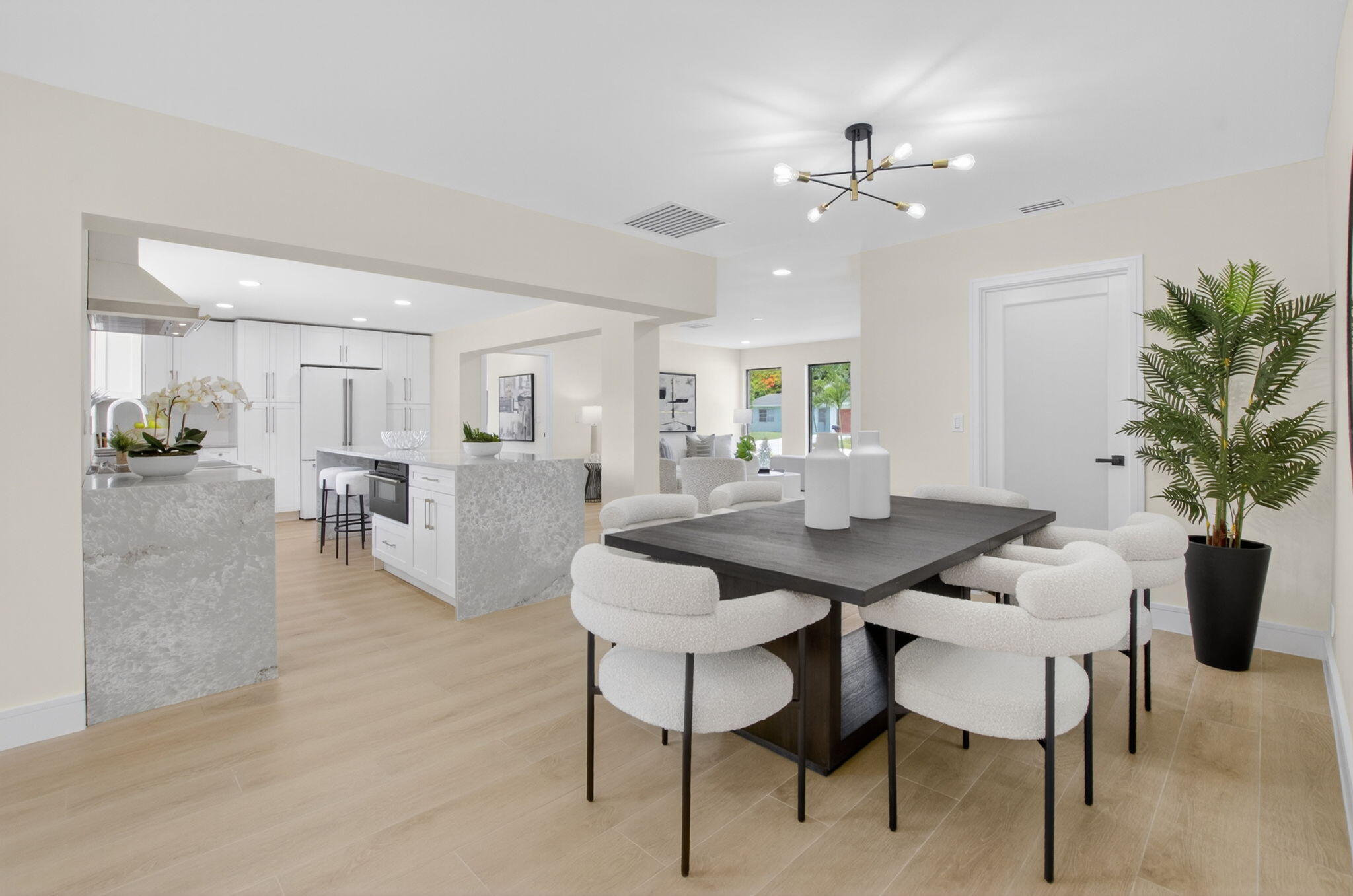 1780 Southwest 9th Street Boca Raton, FL 33486 - Photo 20 of 67 a view of a dining room with furniture and chandelier