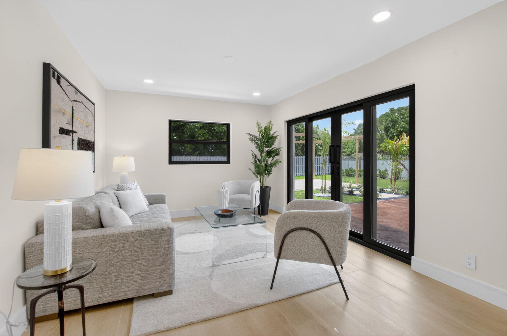1780 Southwest 9th Street Boca Raton, FL 33486 - Photo 23 of 67 a living room with furniture and large window