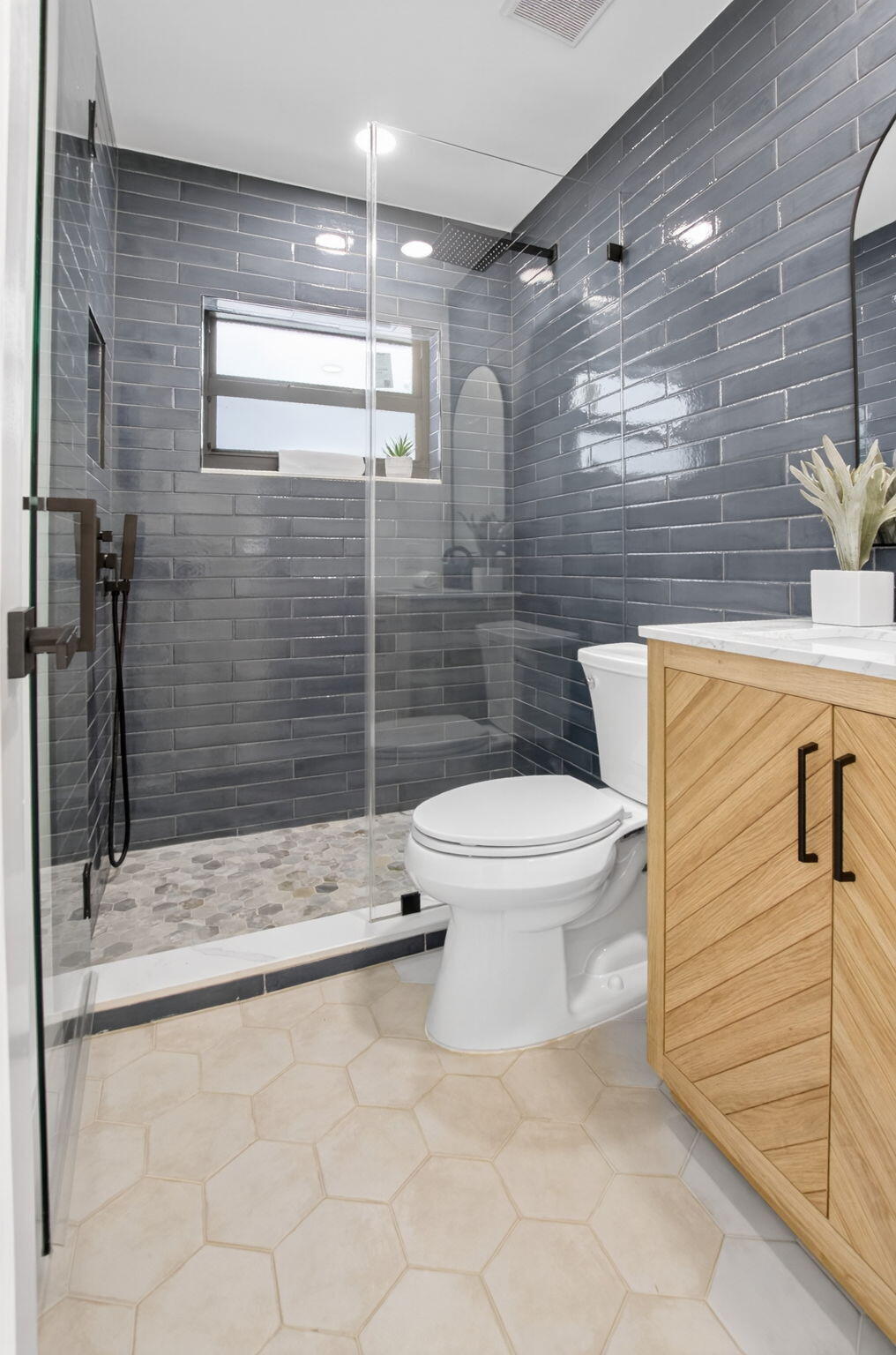 1780 Southwest 9th Street Boca Raton, FL 33486 - Photo 39 of 67 a bathroom with a toilet and a shower