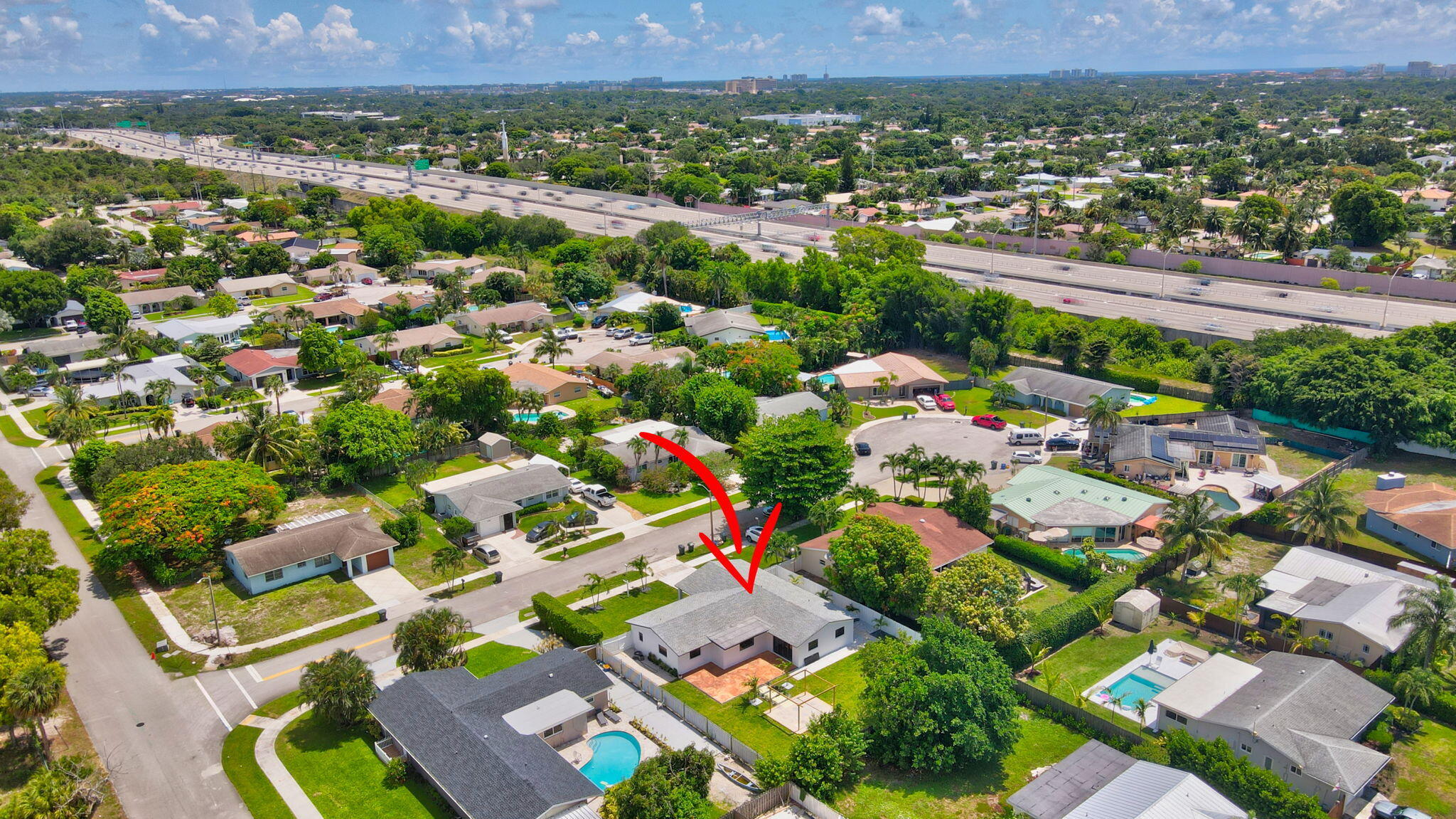 1780 Southwest 9th Street Boca Raton, FL 33486 - Photo 58 of 67 an aerial view of residential houses with outdoor space and parking