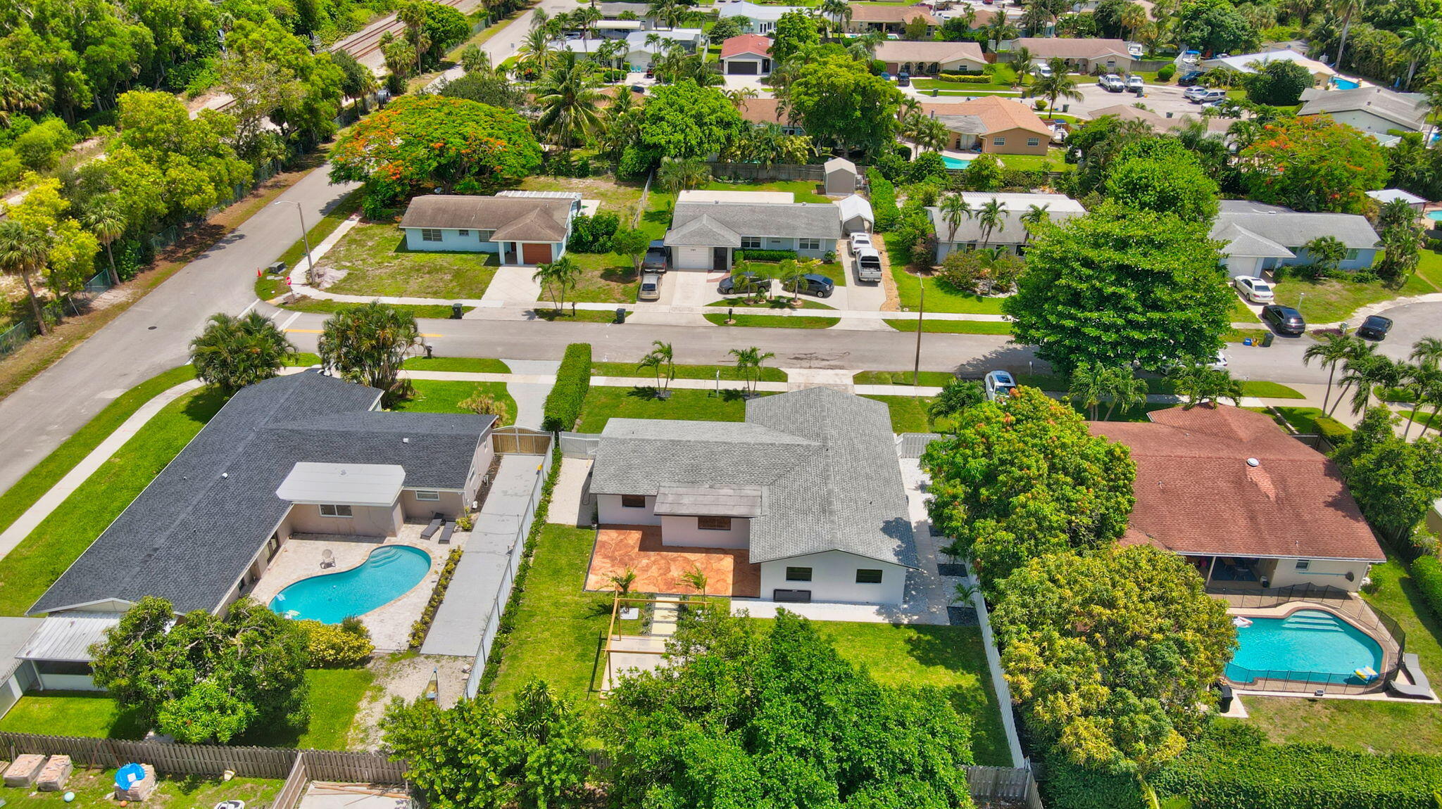 1780 Southwest 9th Street Boca Raton, FL 33486 - Photo 62 of 67 an aerial view of residential houses with outdoor space and parking