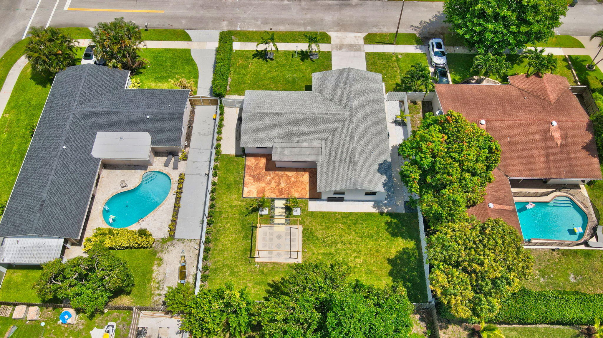 1780 Southwest 9th Street Boca Raton, FL 33486 - Photo 64 of 67 an aerial view of a house with swimming pool outdoor seating and yard
