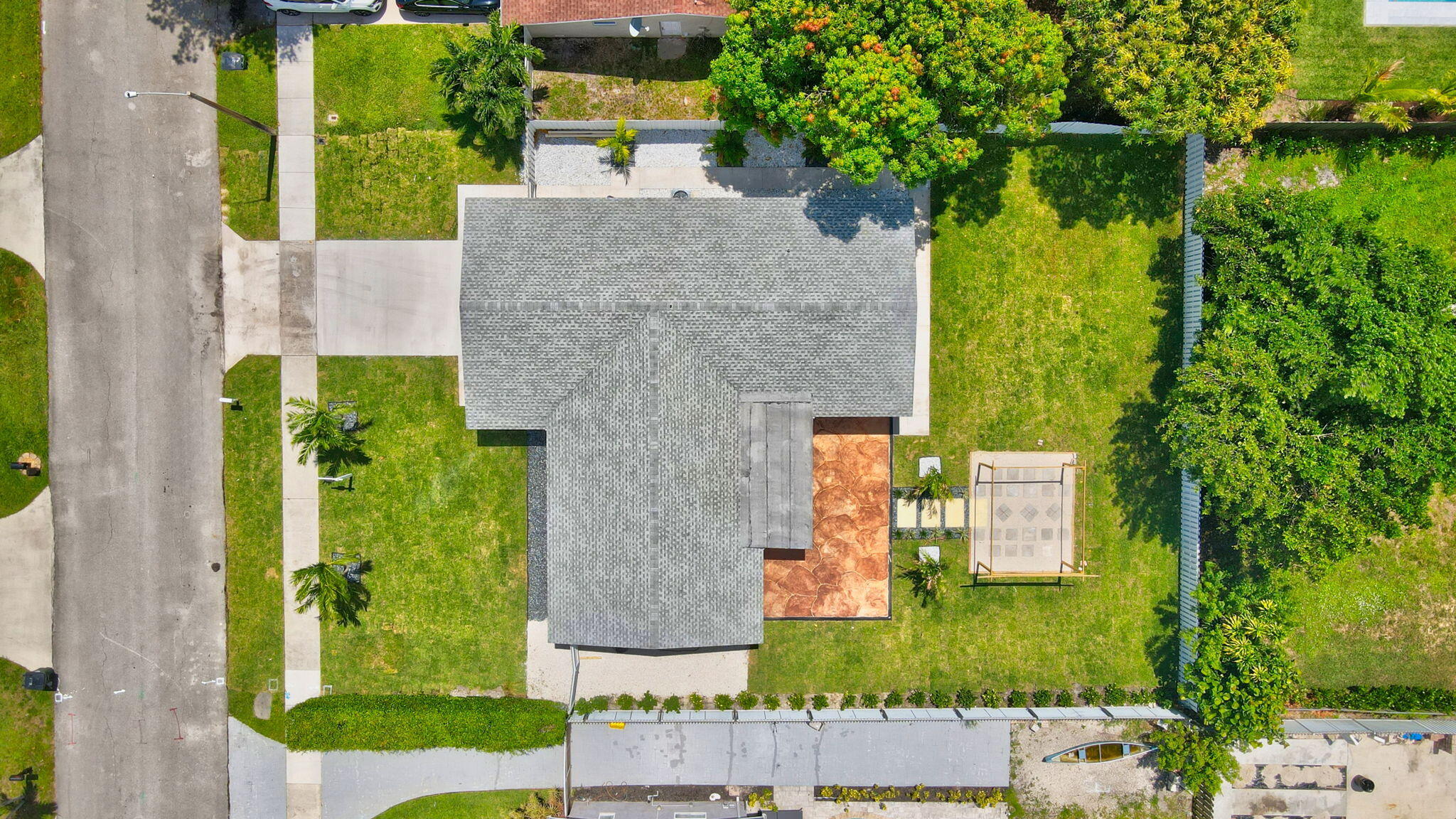 1780 Southwest 9th Street Boca Raton, FL 33486 - Photo 65 of 67 aerial view of a house with a yard basket ball court and outdoor seating