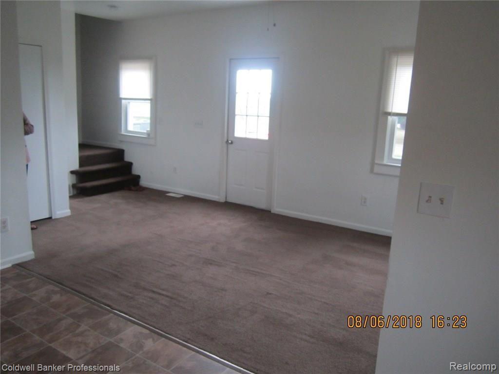 8430 Jefferson Road North Branch, MI 48461 - Photo 13 of 14 8430 Jefferson Living Rm.