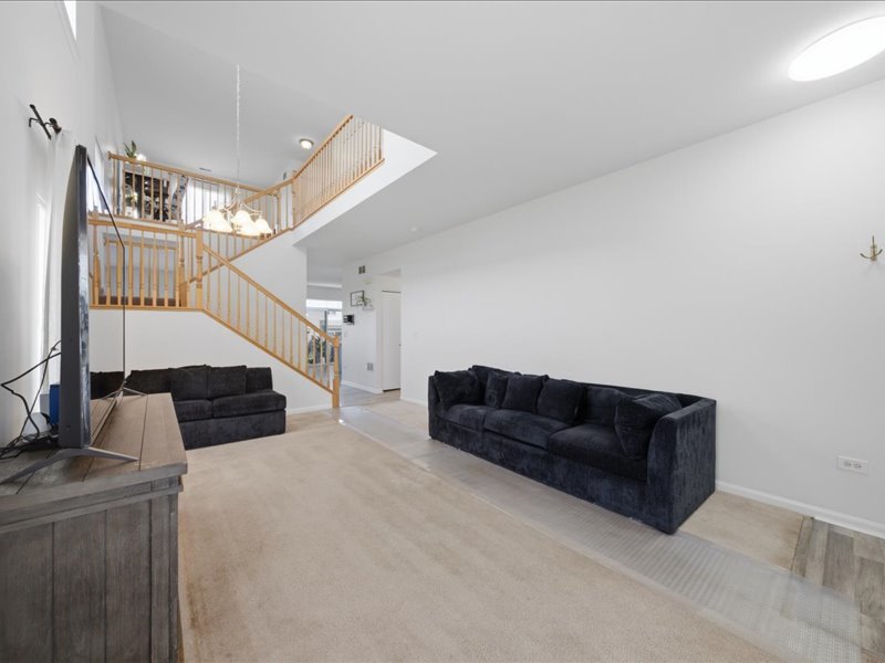 4201 Dillon Street Plano, IL 60545 - Photo 6 of 37 a living room with furniture and a couch