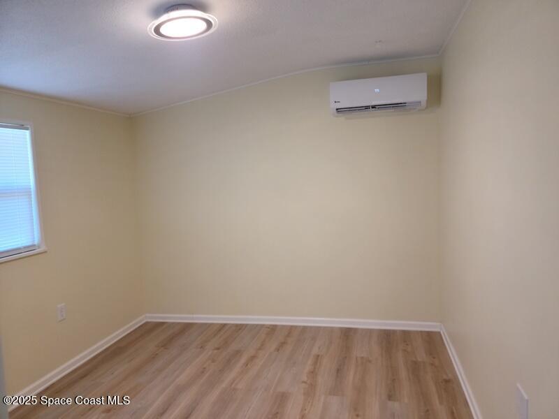 1700 Chaucer Road Titusville, FL 32780 - Photo 6 of 15 a view of an empty room