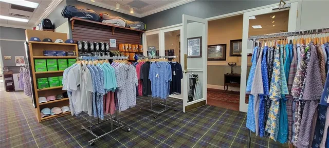 a swimming pool with outdoor seating and yard