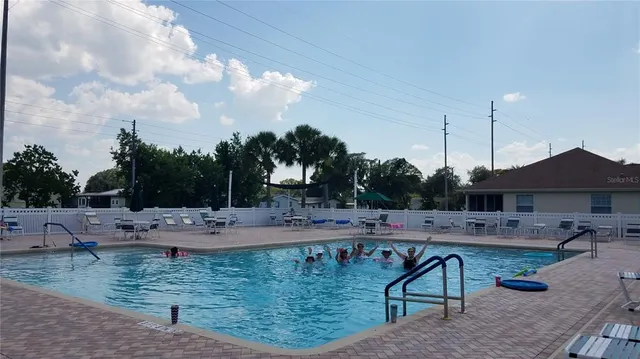 a view of a field with a big yard