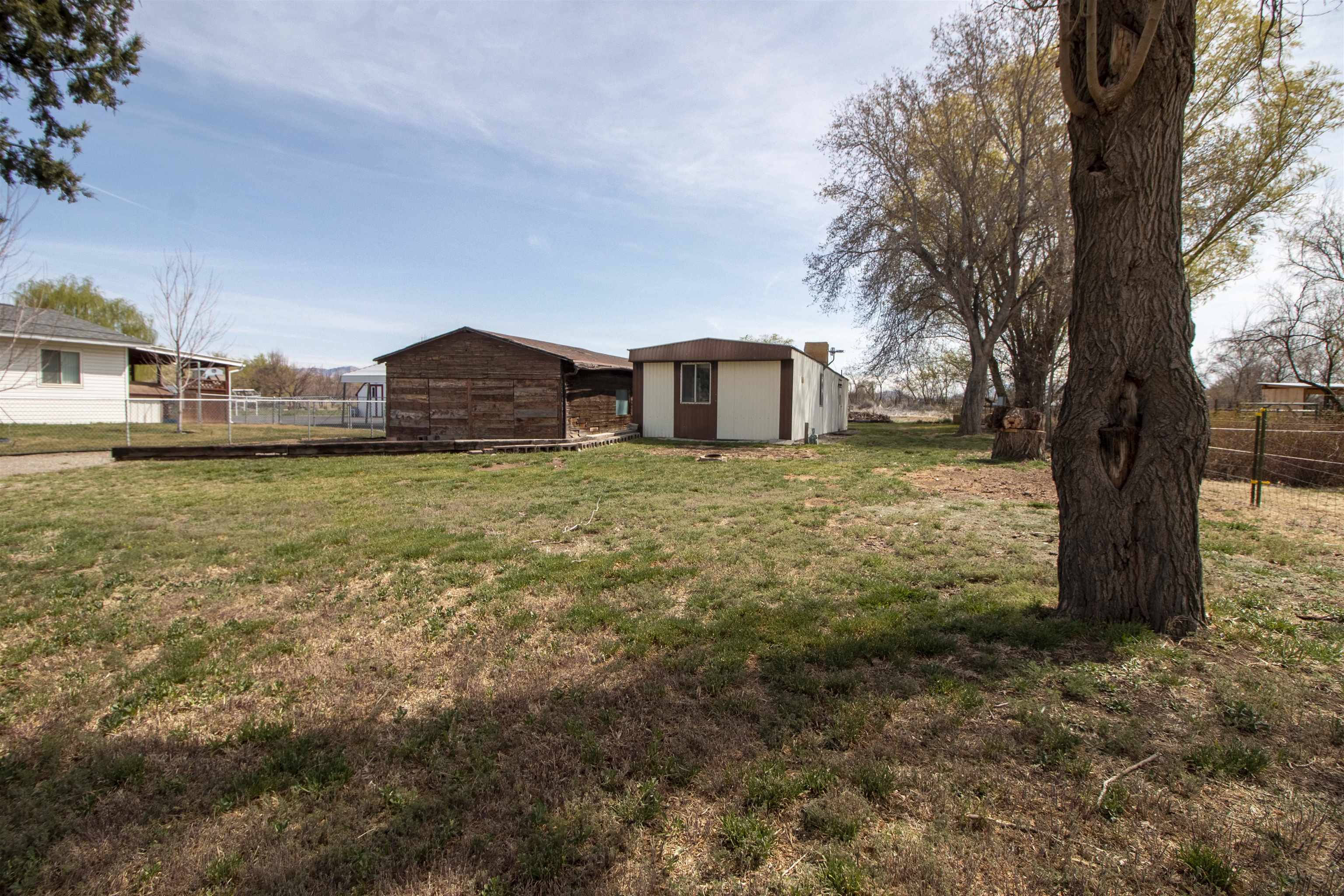 808 24 Road Grand Junction, CO 81505 - Photo 1 of 23 a view of a house with a yard