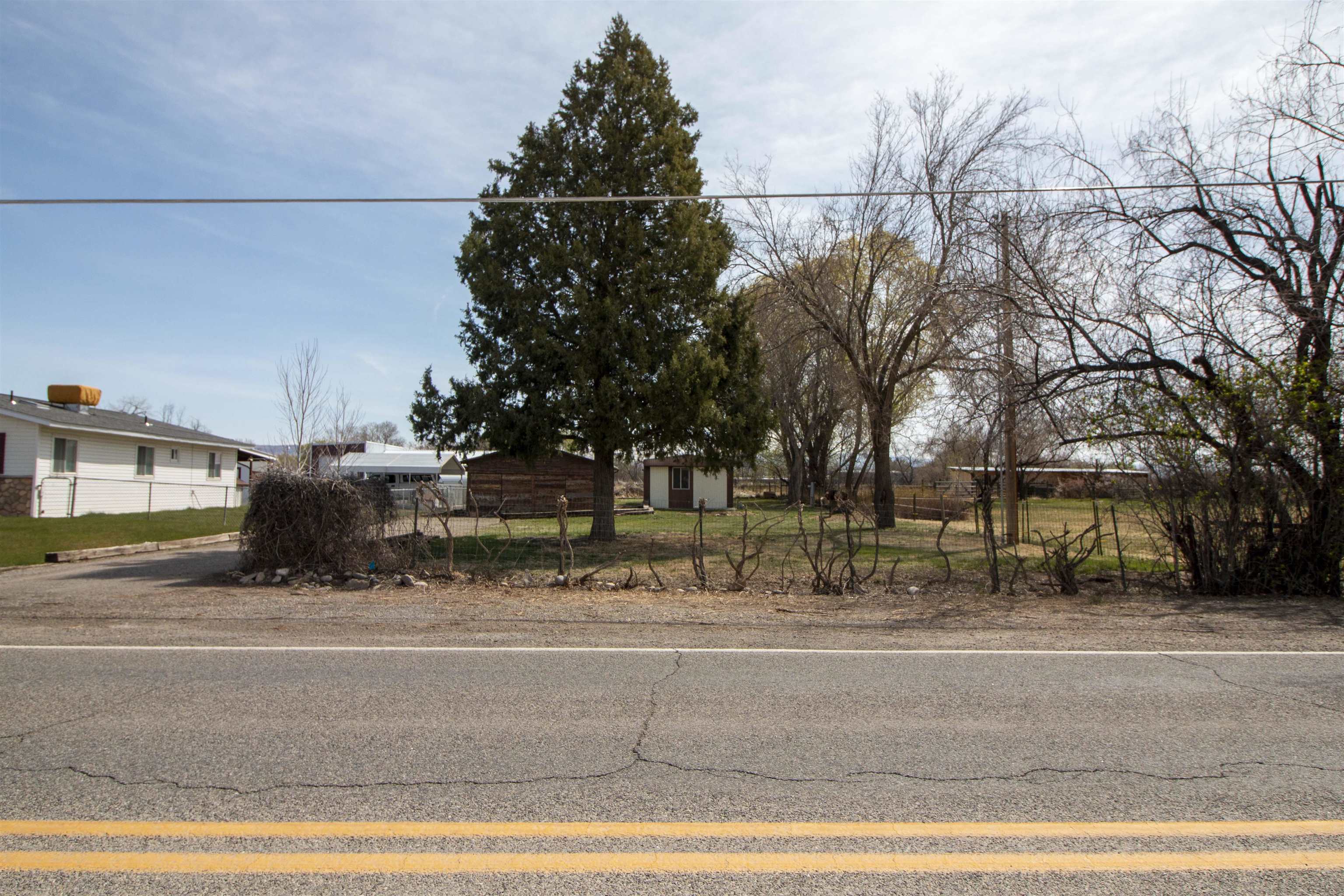 808 24 Road Grand Junction, CO 81505 - Photo 12 of 23 a group of cars parked in front of house