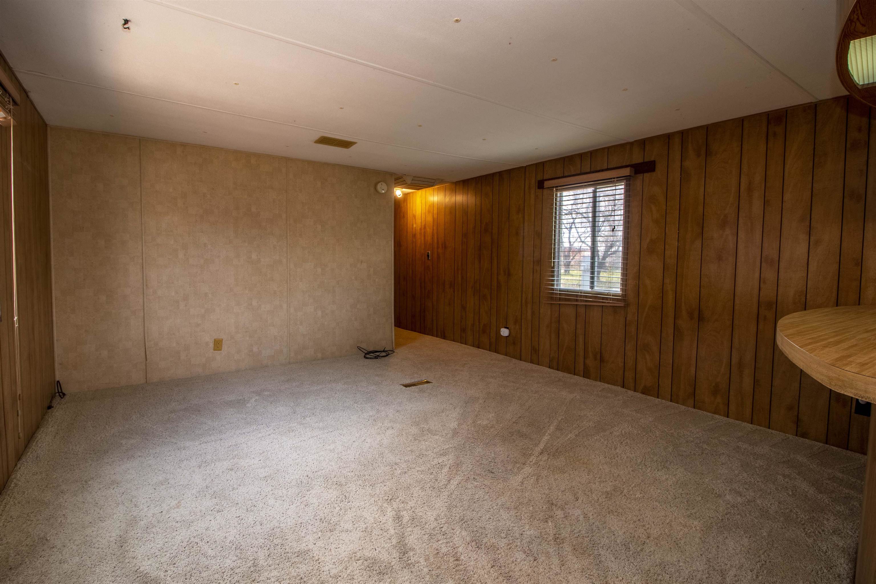 808 24 Road Grand Junction, CO 81505 - Photo 15 of 23 a view of an empty room with a window