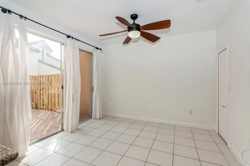 10884 Southwest 89th Street Miami, FL 33176 - Photo 3 of 10 a view of an empty room