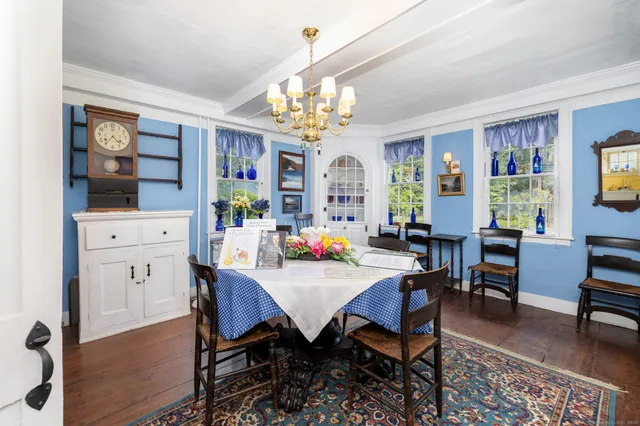 a utility room with cabinets washer and dryer