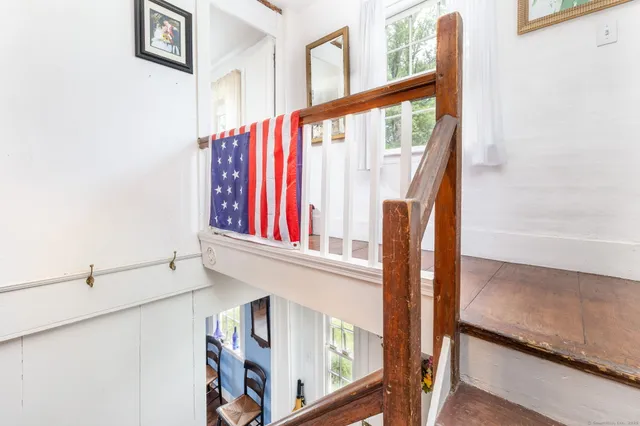 a bedroom with a bed and a walk in closet