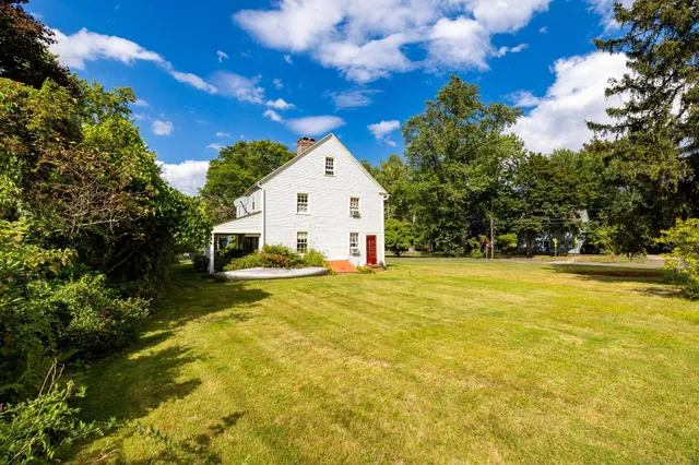 a view of a house with swimming pool